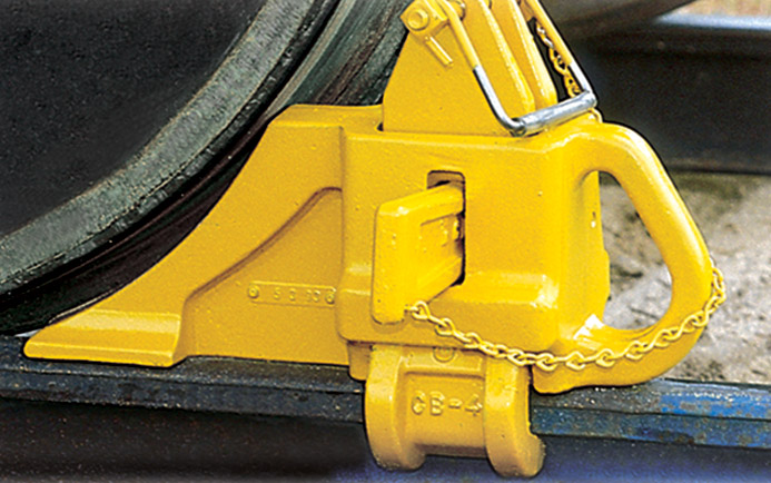Aldon railroad car block for chocking railcars with wedge