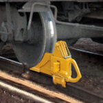 Aldon railroad car block for chocking railcars with wedge